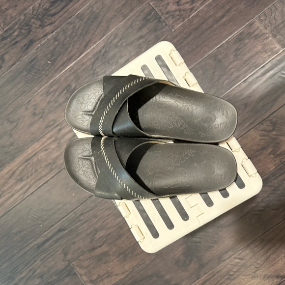 OluKai Black Slide Sandals with Stitch Accent - Picture 3 of 4